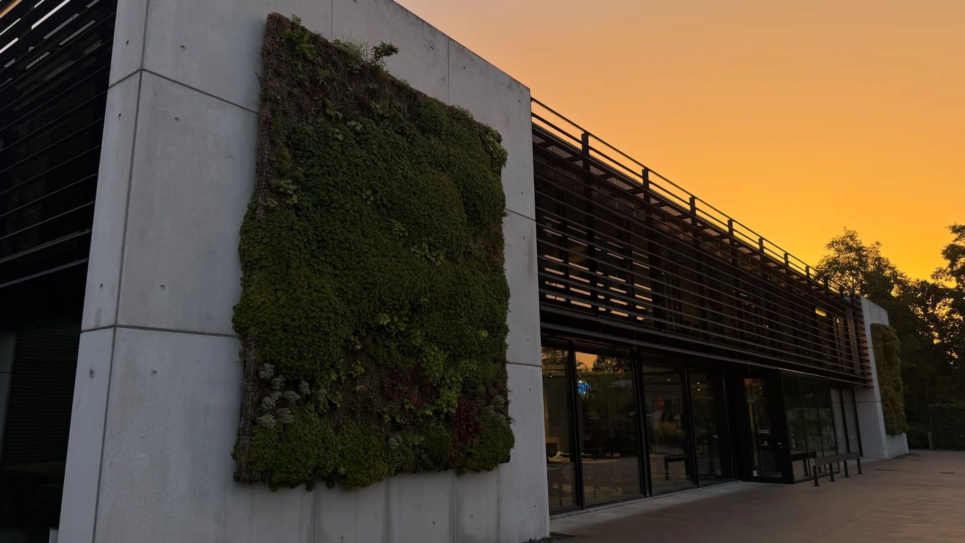 The Cronos incubator building at dusk in Kontich
